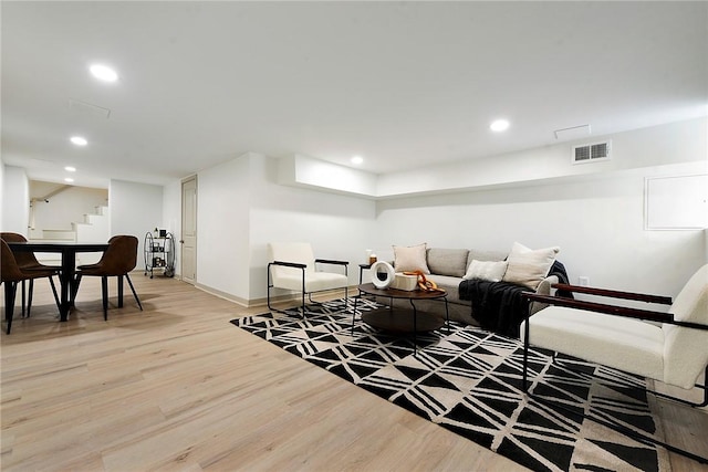 living room with hardwood / wood-style floors