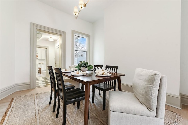 dining room with hardwood / wood-style floors