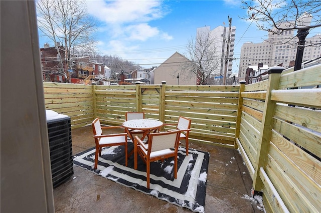 view of patio / terrace featuring a balcony and central AC