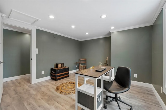 office area featuring ornamental molding and light wood-type flooring