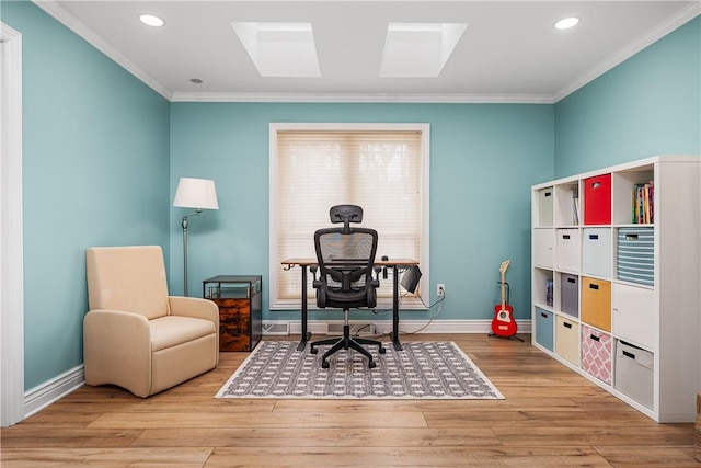 office area featuring light hardwood / wood-style floors and ornamental molding