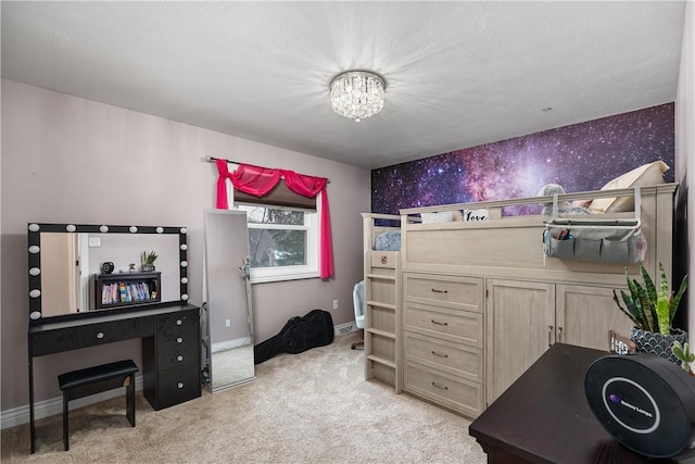 carpeted office with an inviting chandelier