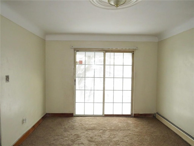 empty room with carpet and a baseboard radiator