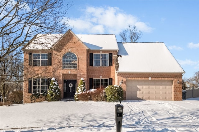 colonial home with a garage