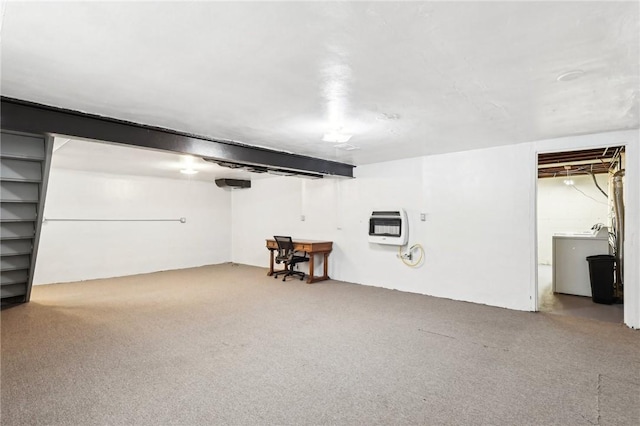 basement with washer / clothes dryer and heating unit