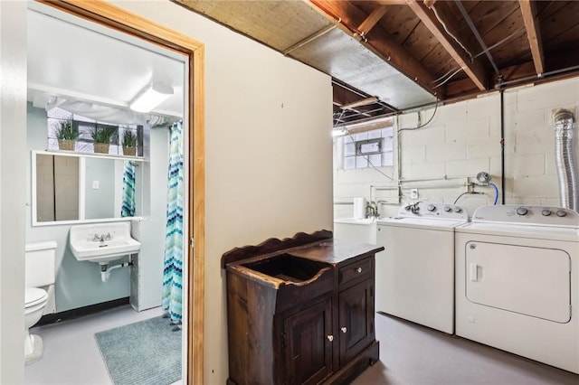 laundry area with plenty of natural light and washing machine and clothes dryer