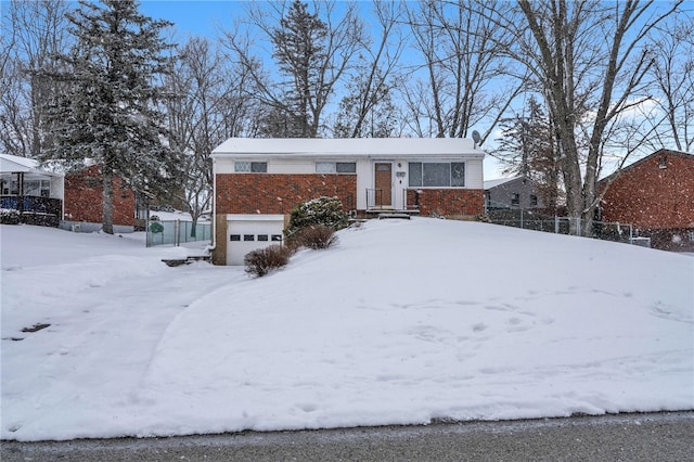 view of front of property featuring a garage