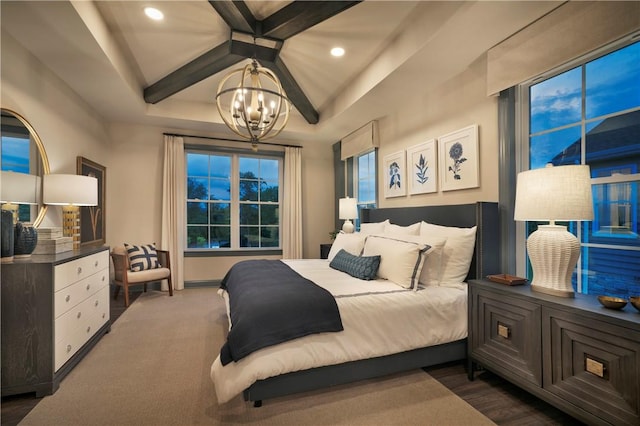 carpeted bedroom featuring beam ceiling and a notable chandelier