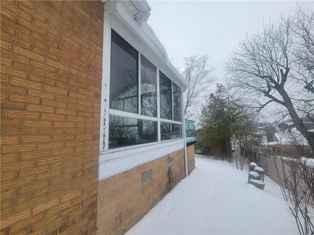 view of snow covered property