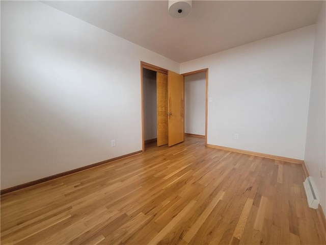 unfurnished bedroom featuring light hardwood / wood-style flooring