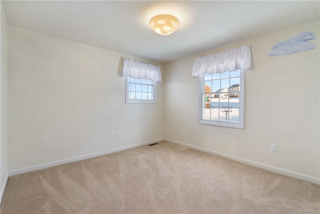 view of carpeted spare room