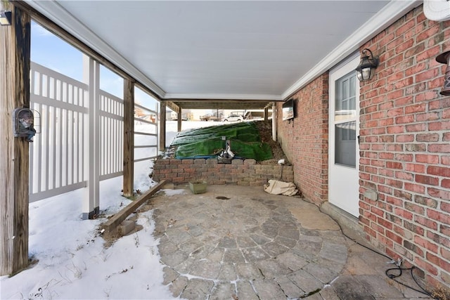 view of snow covered patio