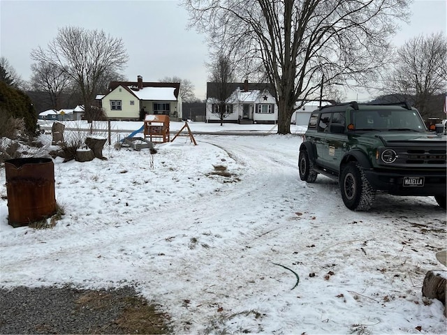 view of yard covered in snow