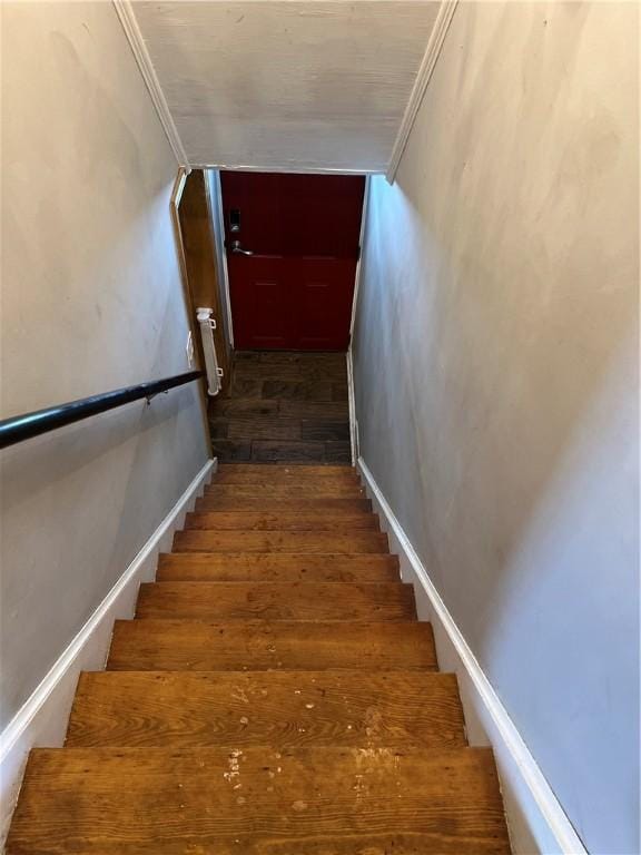 stairs featuring ornamental molding