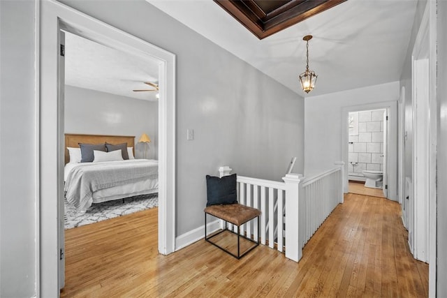 hallway featuring light hardwood / wood-style flooring