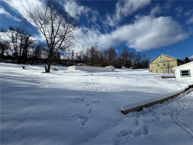 view of yard covered in snow