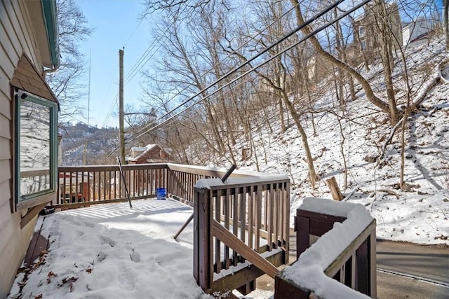 view of snow covered deck