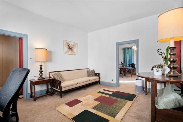 living room featuring light carpet