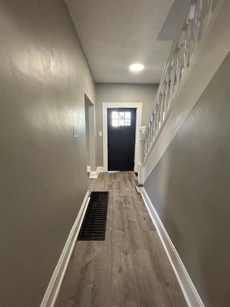 doorway featuring hardwood / wood-style floors