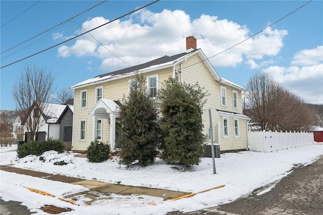 view of snow covered property