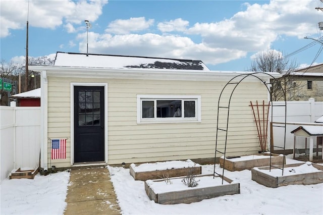 view of snow covered property