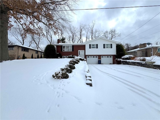 view of front of property featuring a garage