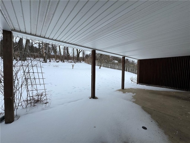 view of yard layered in snow