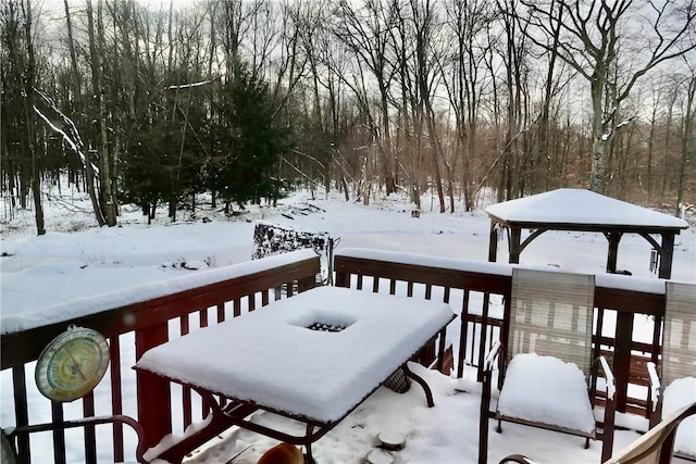 view of snow covered deck