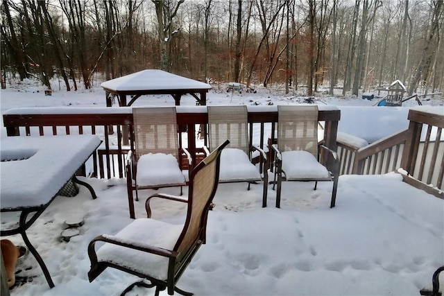 view of snow covered deck