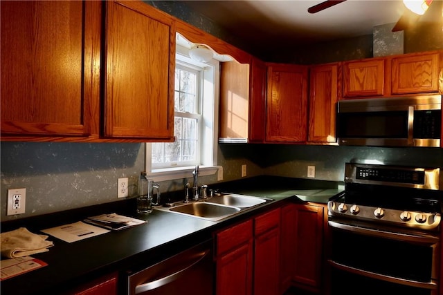 kitchen with ceiling fan, sink, and appliances with stainless steel finishes