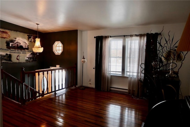 entryway featuring dark hardwood / wood-style flooring and a baseboard radiator