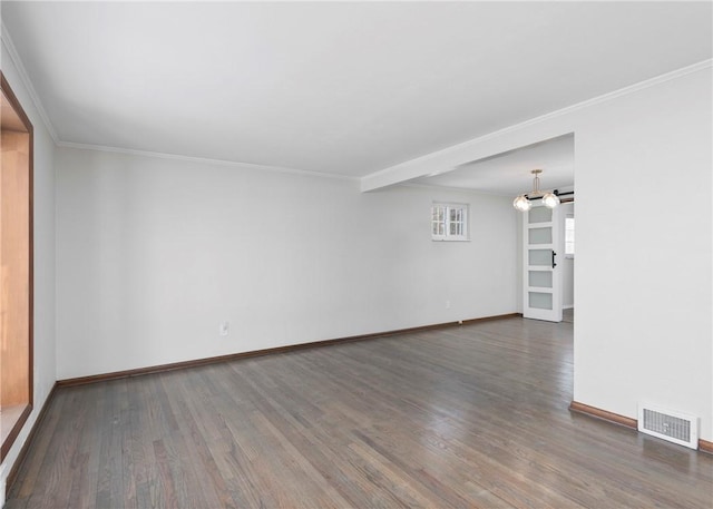 unfurnished room featuring crown molding and dark wood-type flooring