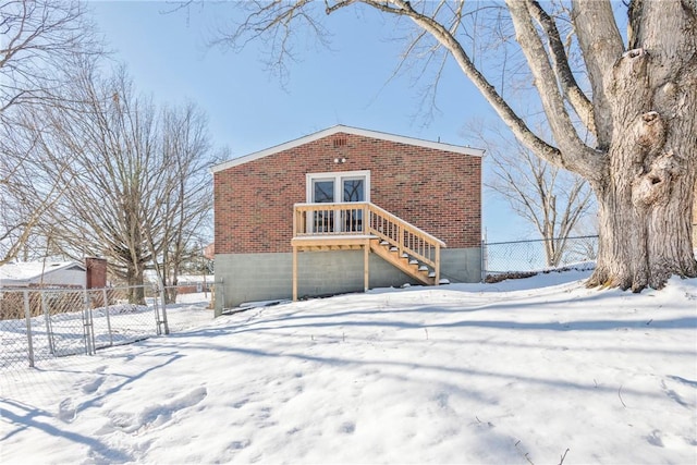 view of snow covered property