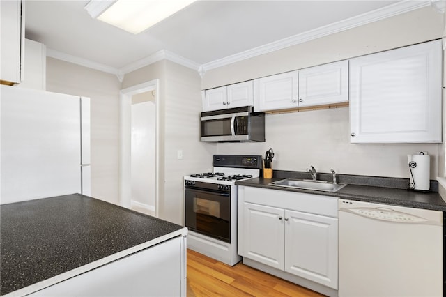 kitchen featuring sink, crown molding, light hardwood / wood-style floors, white appliances, and white cabinets