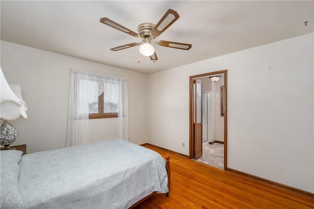 bedroom featuring ceiling fan and light wood-type flooring