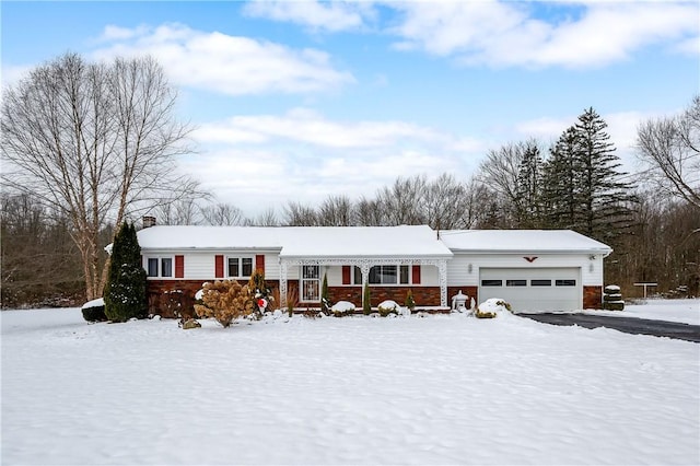 view of front of property with a garage