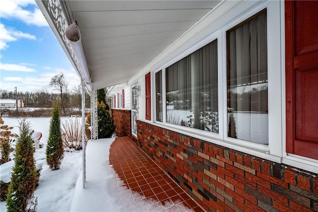 view of snow covered patio