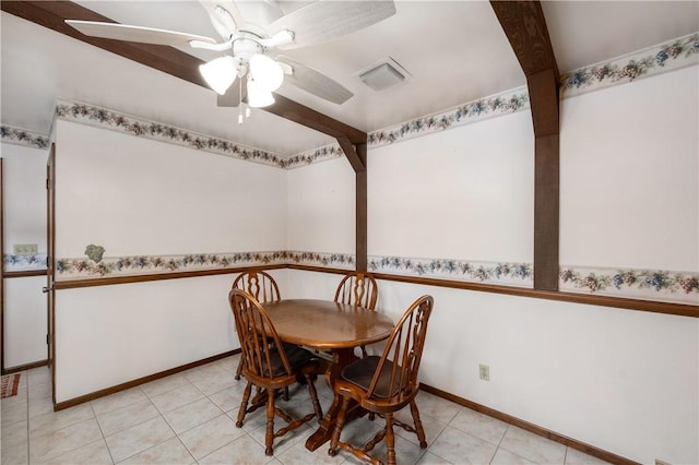 tiled dining space with ceiling fan