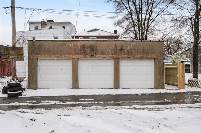 view of snow covered garage