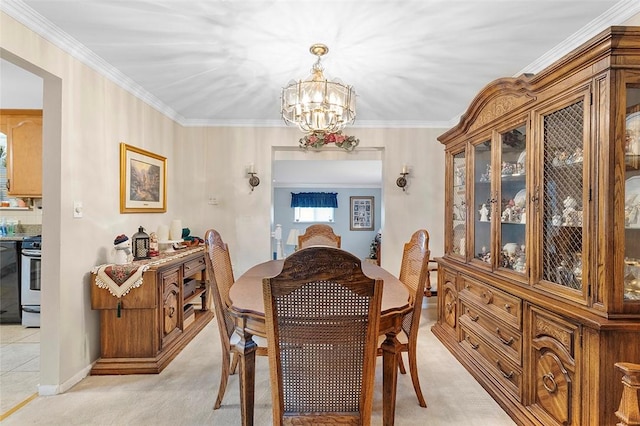 carpeted dining area featuring crown molding and an inviting chandelier