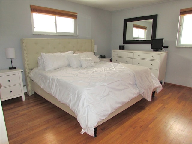 bedroom featuring hardwood / wood-style flooring