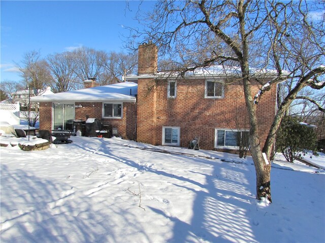 view of snow covered house