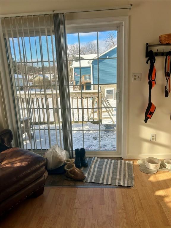 doorway to outside featuring hardwood / wood-style flooring