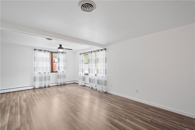 unfurnished room with ceiling fan and wood-type flooring