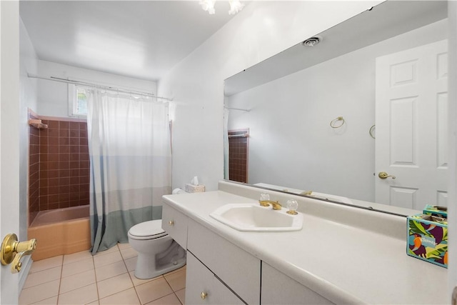 full bathroom with tile patterned floors, shower / tub combo with curtain, vanity, and toilet