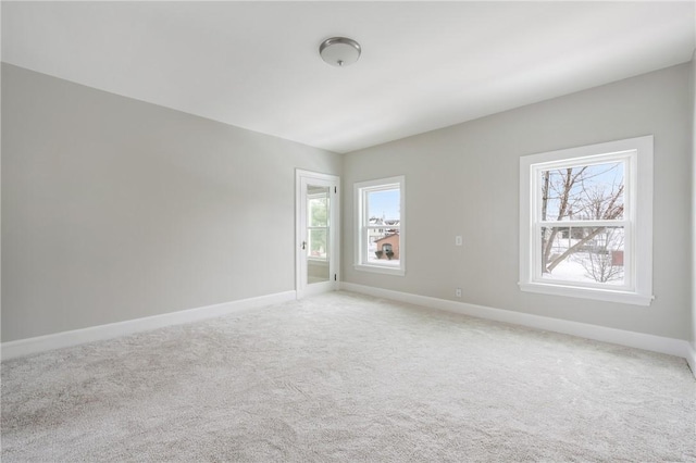 spare room featuring carpet floors