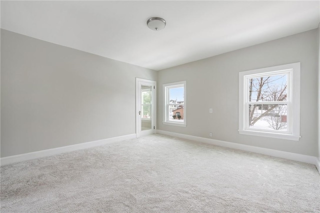 3134 Main St, West Middlesex Boro, PA 16159 - empty room with plenty of natural light, light carpet, and baseboards