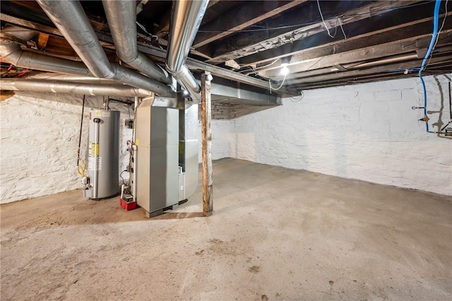 basement featuring heating unit and gas water heater