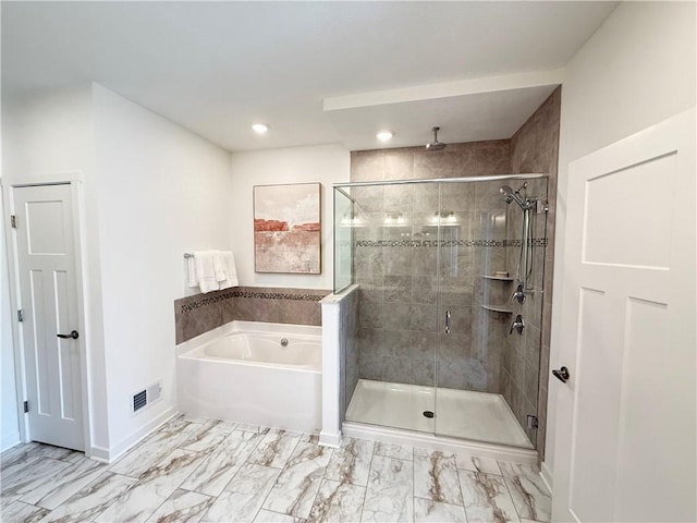 bathroom with independent shower and bath