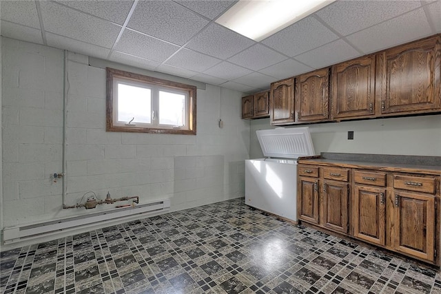 laundry room with baseboard heating